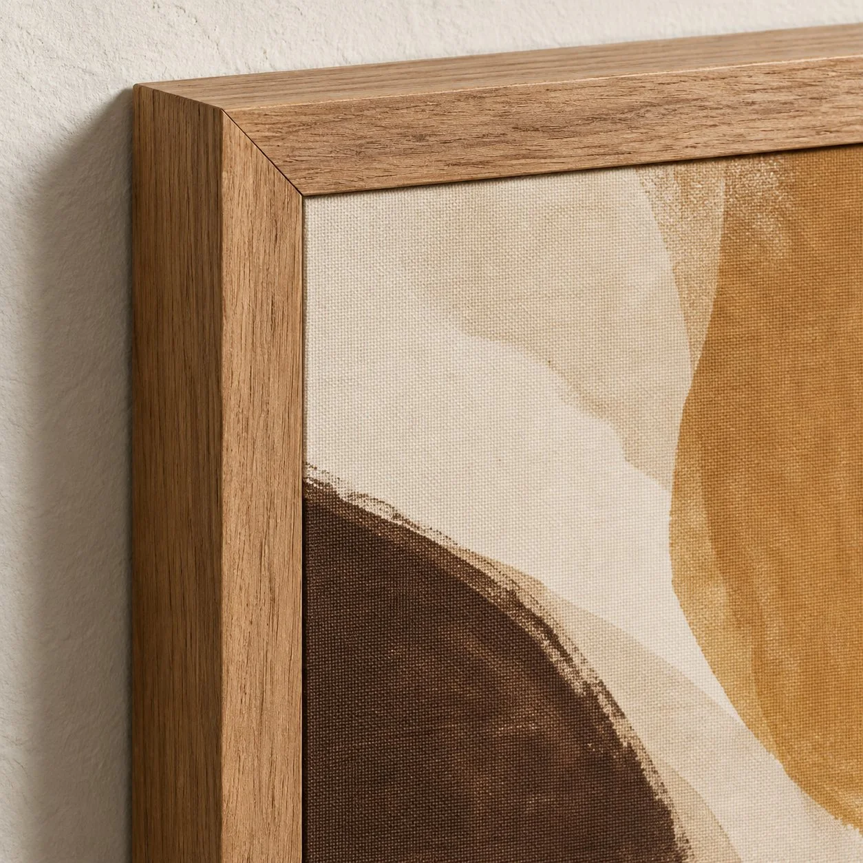 Esquina de un cuadro en lienzo con marco de madera