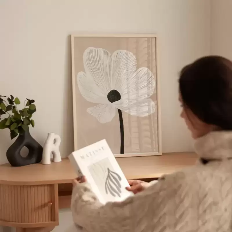 Cuadro con flores en un ambiente